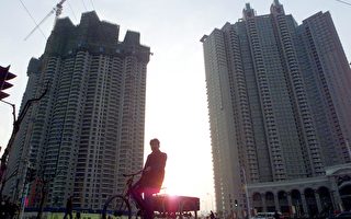 上半年中国50家上市房企净利亏损902亿